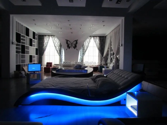 3D modern bedroom with multicolored led strip lights generative ai ... Bedroom furniture with LED lighting